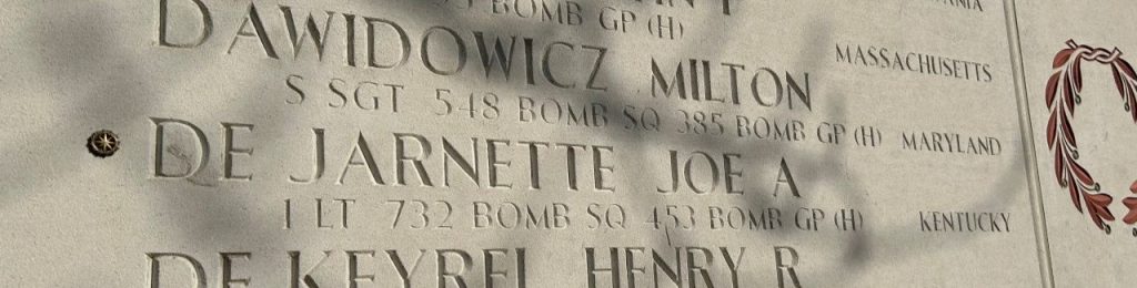 A bronze rosette next to the name of Joe A. De Jarnette on the Wall of the Missing signifies he has been identified.