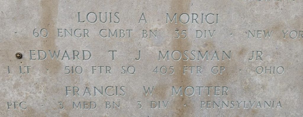 A rosette next to the name of 1st Lt. Edward T. J. Mossman Jr. on the Walls of the Missing at Lorraine American Cemetery signifies he has been identified. (ABMC photo)