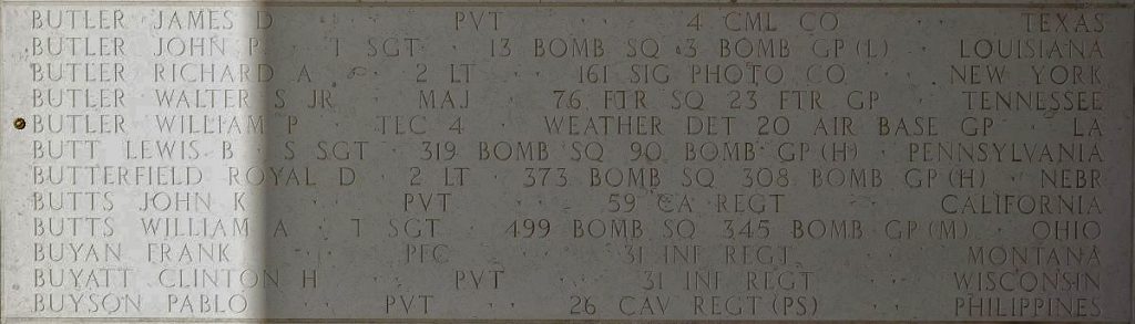 A rosette next to the name of Tech 4 William P. Butler on the Walls of the Missing at Manila American Cemetery signifies he has been identified. (ABMC photo)