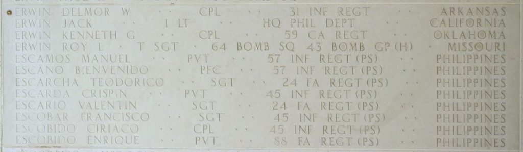 A rosette next to the name of Cpl. Delmor W. Erwin on the Walls of the Missing at Manila American Cemetery signifies he has been identified. (ABMC photo)