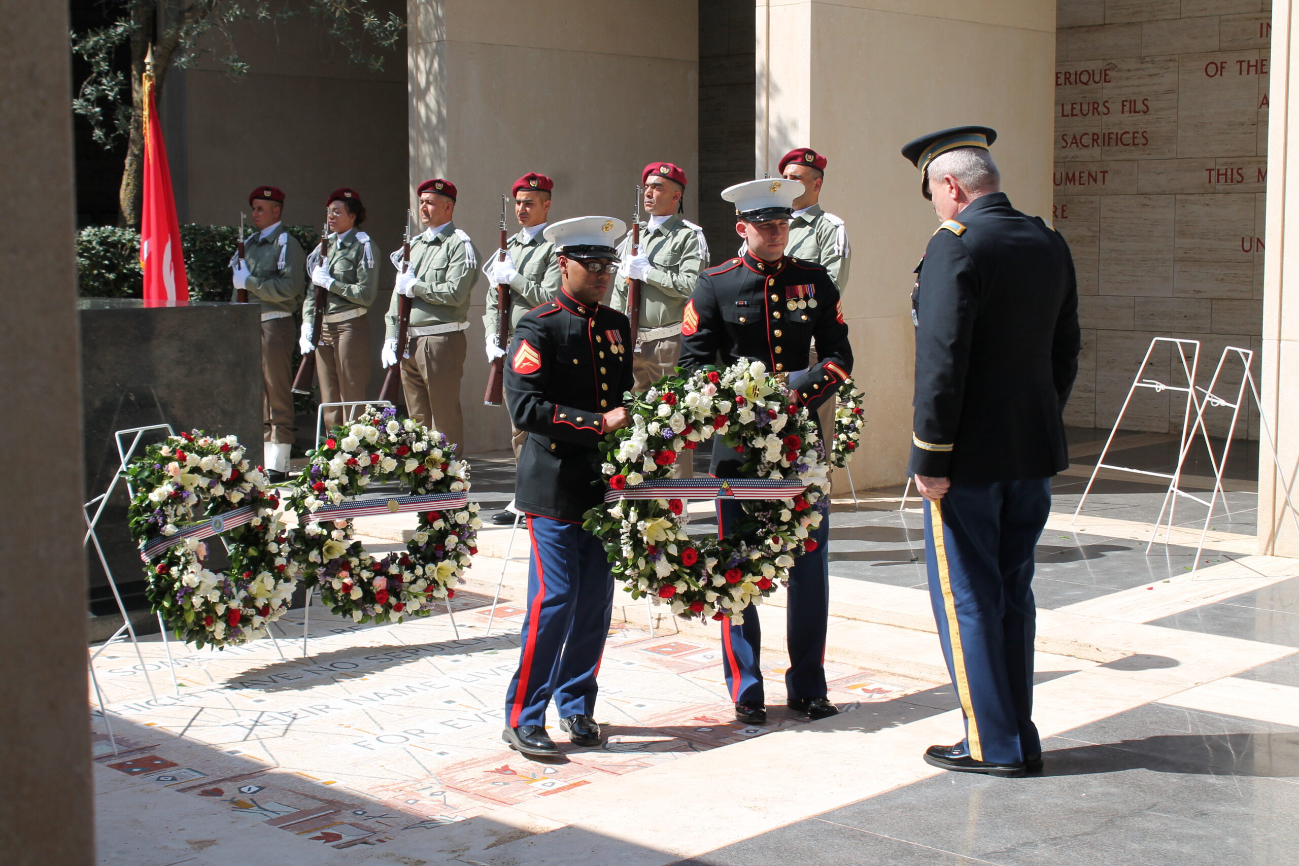 Col. Kenneth Adgie lays a wreath for the First Armored Division during the 2016 Memorial Day Ceremony at North Africa American Cemetery. Image courtesy of AFRICOM.