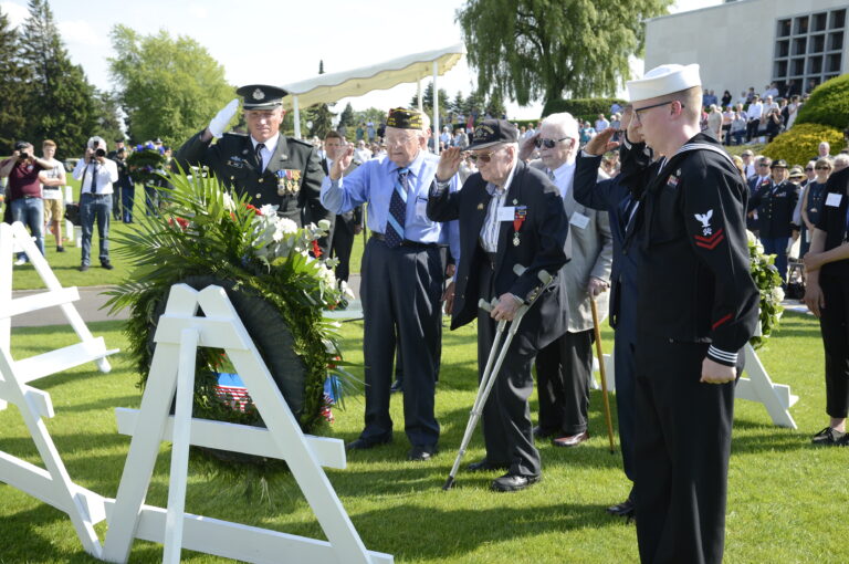 World War II veterans laid a wreath during the 2018 Memorial Day Ceremony at Henri-Chapelle American Cemetery in Belgium. Image courtesy of U.S. Embassy Belgium.