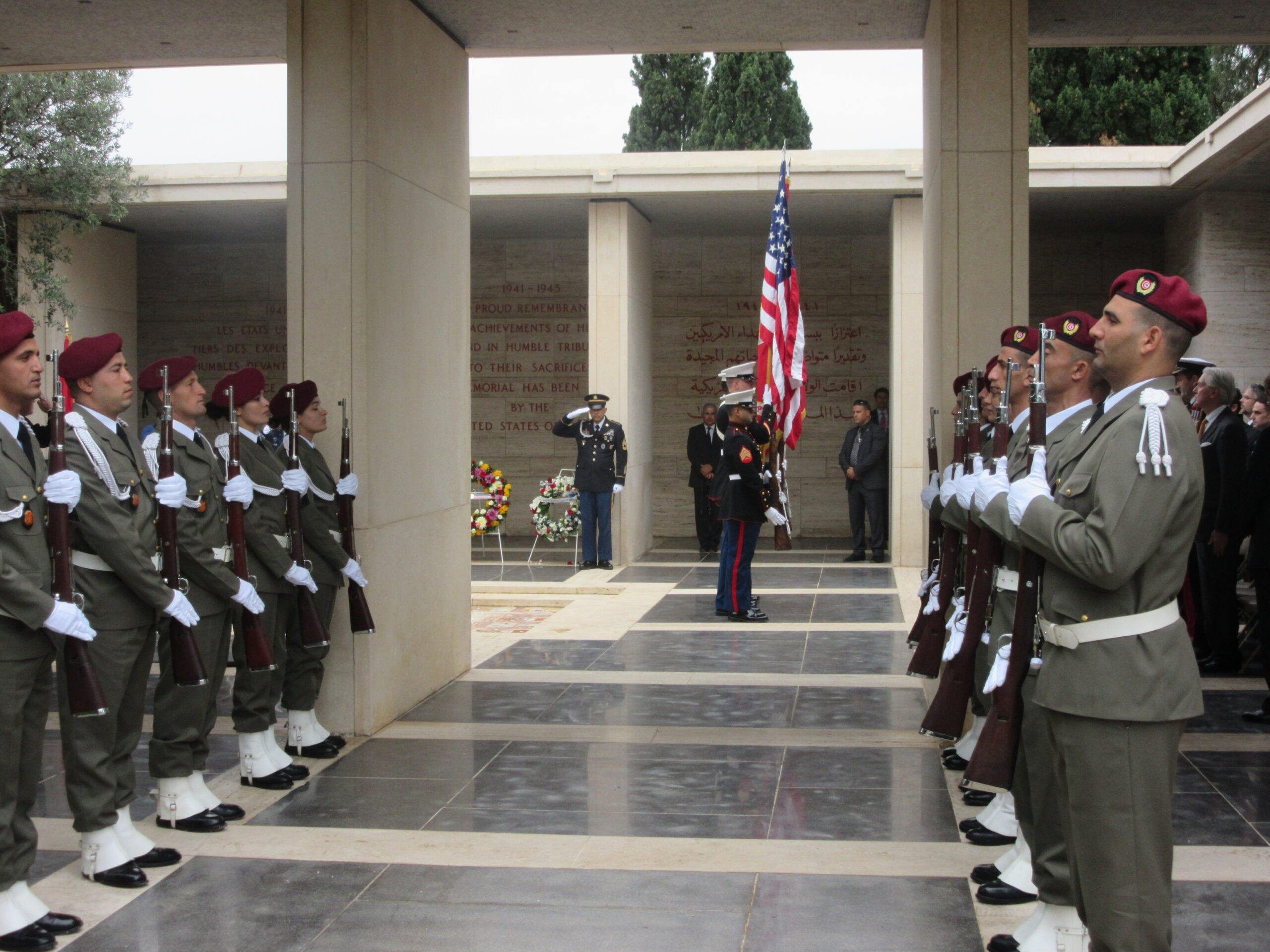 Members of the U.S. Marine Corps post the colors during the 2015 Veterans Day Ceremony at North Africa American Cemetery.