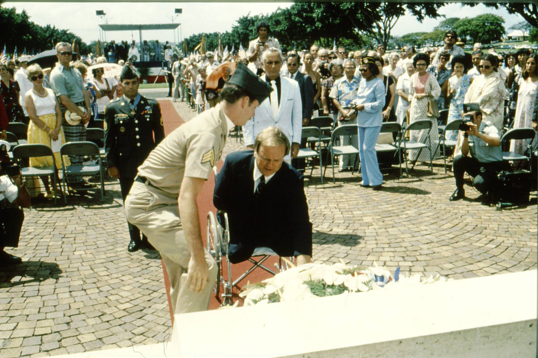 Max Cleland, a Vietnam veteran, and head of the Department of Veterans Affairs at the time, laid a wreath as part of the Memorial Day 1980 ceremony at the Honolulu Memorial. Cleland would later serve as the Secretary of ABMC (2009-2017). Max Cleland, a Vietnam veteran, and head of the Department of Veterans Affairs at the time, laid a wreath as part of the Memorial Day 1980 ceremony at the Honolulu Memorial. Cleland would later serve as the Secretary of ABMC (2009-2017).