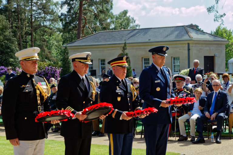 Members of the military prepare to lay wreaths during the 2018 Memorial Day Ceremony at Brookwood American Cemetery. Image courtesy of Antony McCallum.