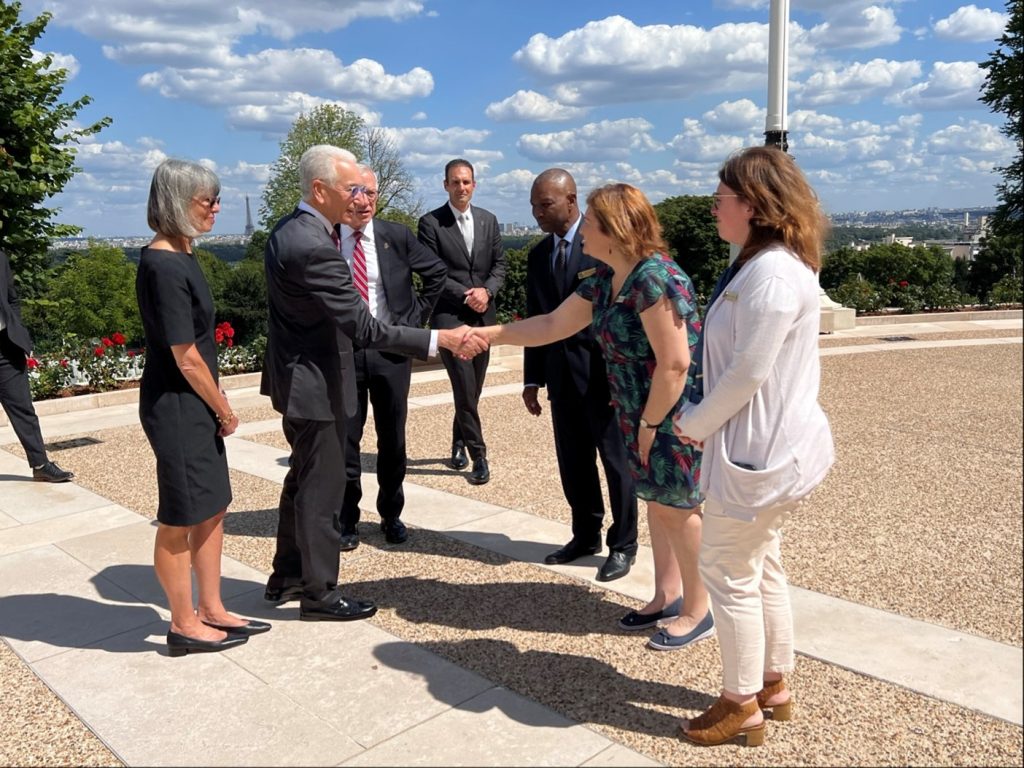 U.S. Ambassador to France and his wife Seryl greet the Suresnes American Cemetery team during their visit of the site July 10. Credit: American Battle Monuments Commission.