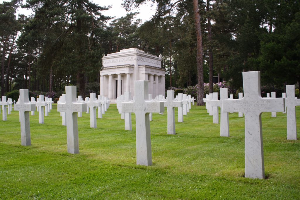 Picture of Brookwood American Cemetery with some headstones in the foreground and the chapel in the background. Credit: American Battle Monuments Commission. 