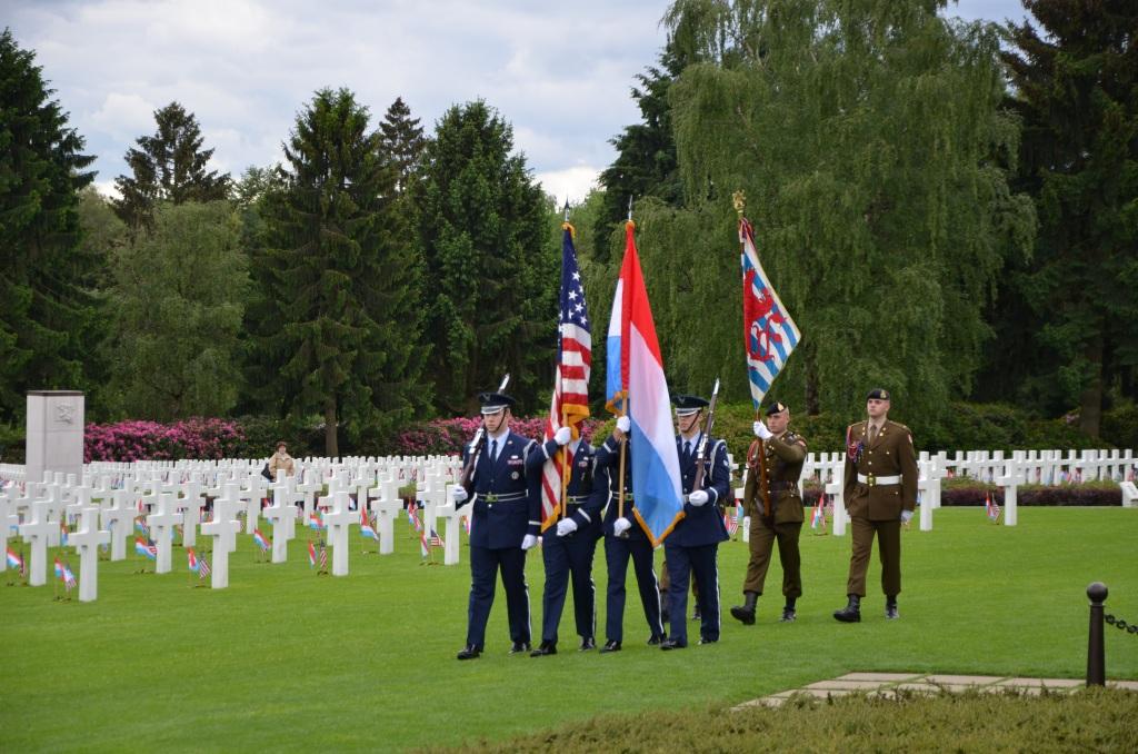 The color guard marches in during the 2014 Memorial Day Ceremony at Luxembourg American Cemetery.