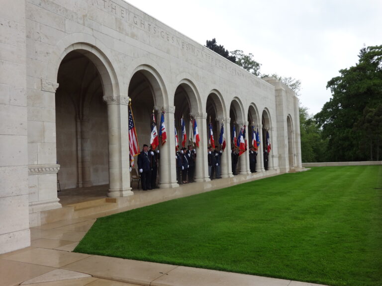 Members of the Porte Drapeaux stand under the loggia during the 2016 Memorial Day Ceremony at Meuse-Argonne American Cemetery.