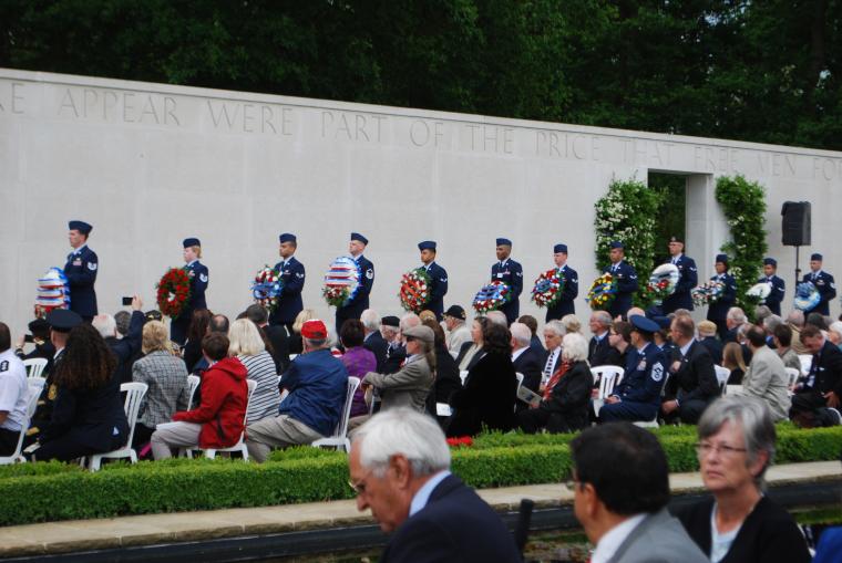 Floral wreaths are presented during the 2014 Memorial Day Ceremony at Cambridge American Cemetery in England.