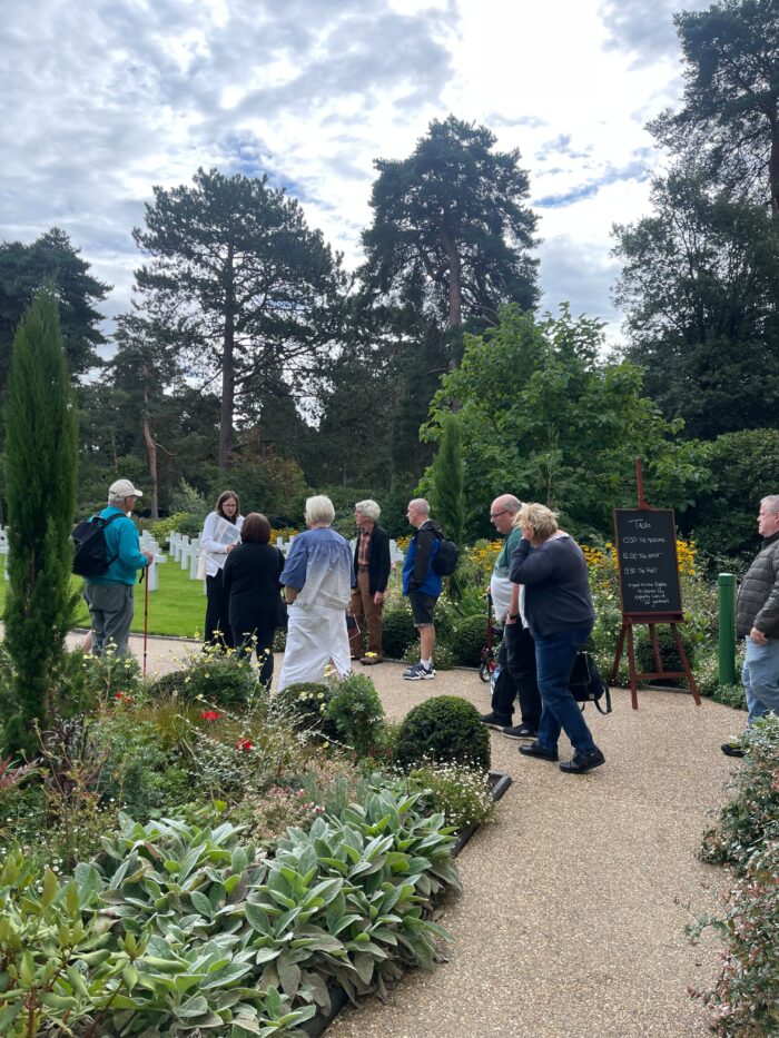 Visitors gathering around the guide at Brookwood American cemetery to get a tour during European heritage Days 2026.