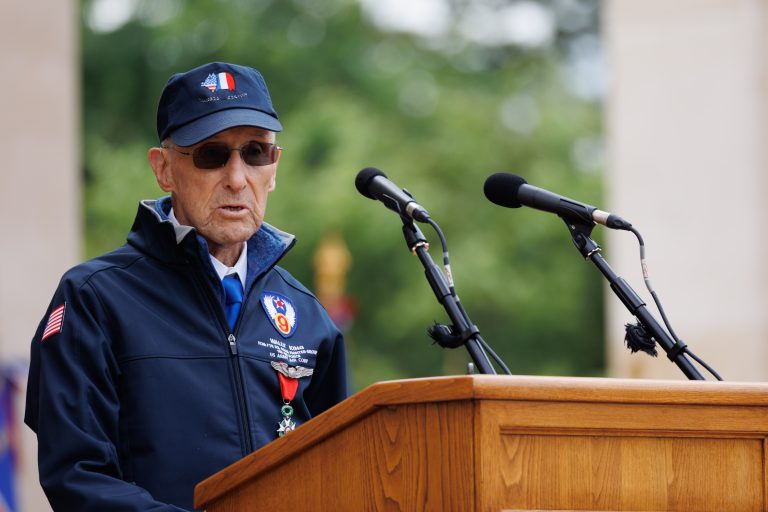 Veteran Wally King, 513th Fighter Squadron, 406th Fighter Group, 9th Air Force, delivering remarks at Normandy American Cemetery for June 6, 2025, ceremony. Credit: American Battle Monuments Commission/Anthony Gaudun