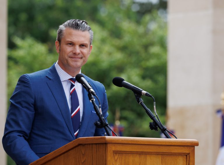 U.S. Secretary of Defense Peter Hegseth delivering remarks at Normandy American Cemetery for June 6, 2025, ceremony. Credit: American Battle Monuments Commission/Anthony Gaudun.