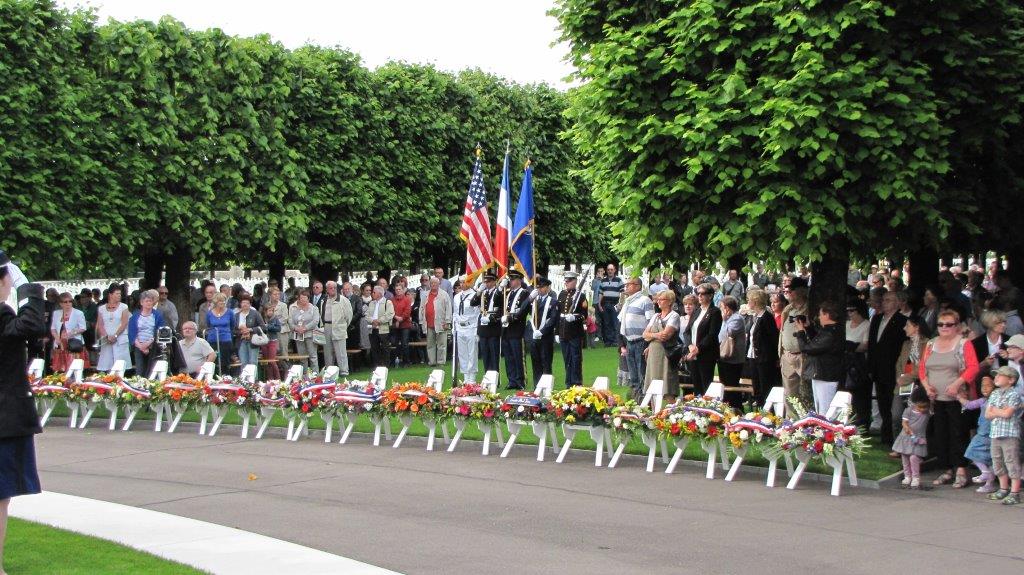 Attendees look on during the 2014 Memorial Day Ceremony at St. Mihiel American Cemetery after the wreaths have been laid.