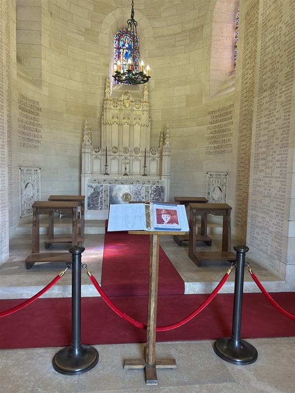 Picture of the binder with the stories of service members highlighted in the chapel for Faces of Aisne-Marne American Cemetery. Credit: American Battle Monuments Commission.  
