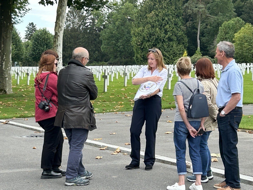 Visitors following a tour at Aisne-Marne American Cemetery. Credits: American Battle Monuments Commission