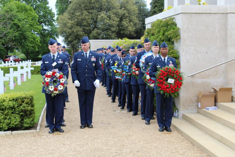 Members of the U.S. Air Force assist with the wreath laying during the 2015 Memorial Day Ceremony at Cambridge American Cemetery.