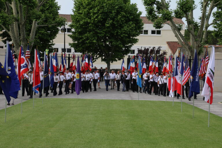 Local citizens served as flag bearers during the 2018 Memorial Day Ceremony at Rhone American Cemetery. Image courtesy of Michel Delannoy.