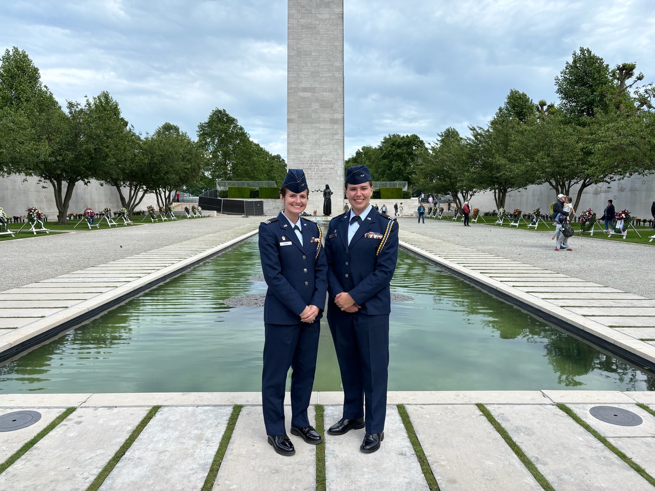 U.S. Air Force ROTC cadets and ABMC International Fellows Anaiya Harris and Catherine Prince stand in front of the memorial tower at the Netherlands American Cemetery. As part of their fellowship, the pair spent about two weeks at the site learning about its operation and assisting with their annual Memorial Day ceremony. Credits: American Battle Monuments Commission. U.S. Air Force ROTC cadets and ABMC International Fellows Anaiya Harris and Catherine Prince stand in front of the memorial tower at the Netherlands American Cemetery. As part of their fellowship, the pair spent about two weeks at the site learning about its operation and assisting with their annual Memorial Day ceremony. Credits: American Battle Monuments Commission.