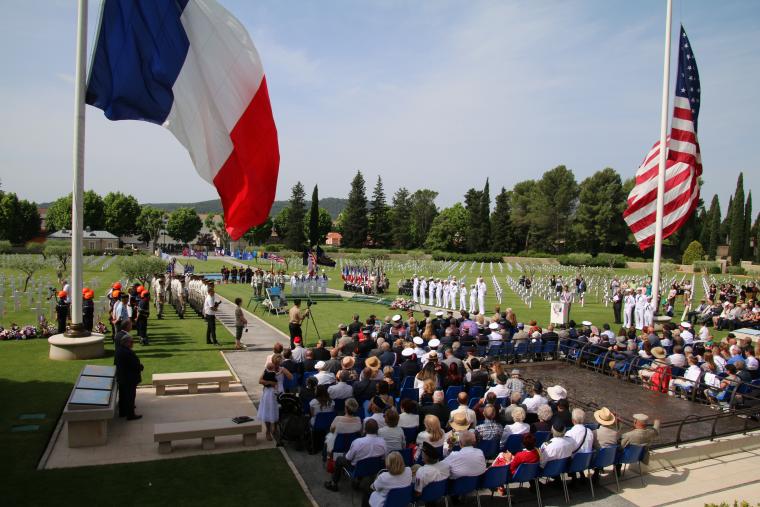 The 2018 Memorial Day Ceremony at Rhone American Cemetery took place outside the memorial building. Image courtesy of Michel Delannoy.