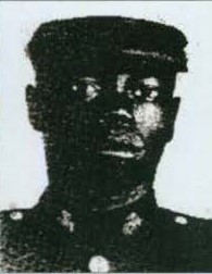 Black and white photograph of James Calven Thomas in Marine Corps uniform.