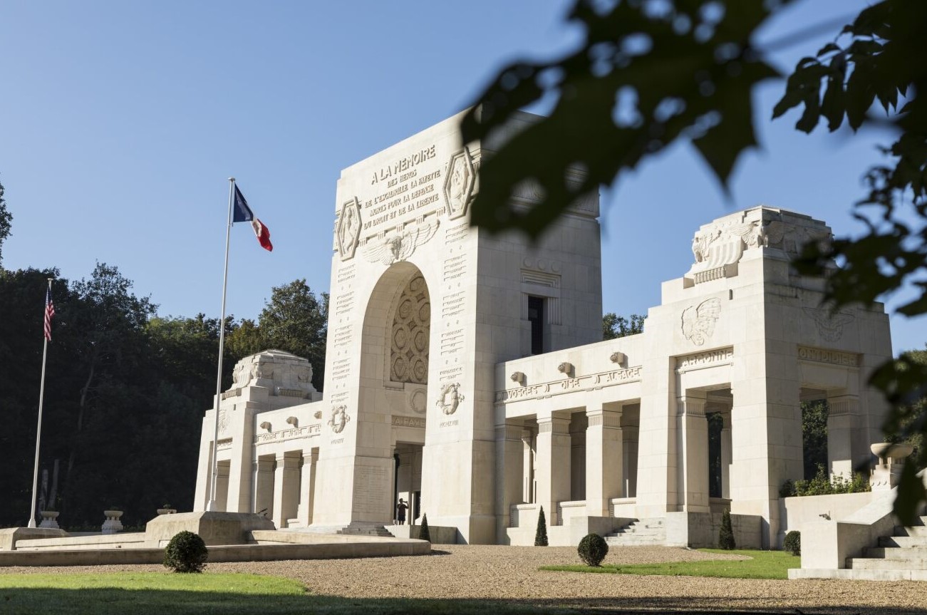 Picture of Lafayette Escadrille Memorial Cemetery with the two flags in front of it. Credit: American Battle Monuments Commission.
