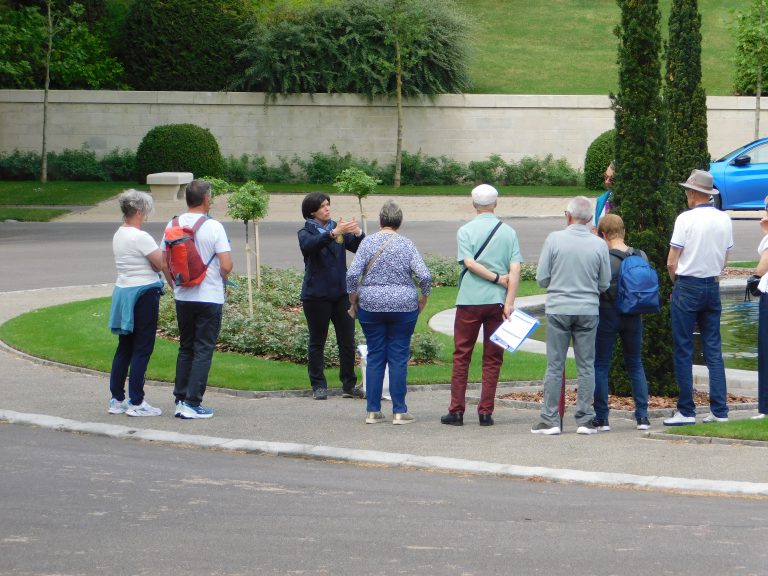 Visitors with the Meuse-Argonne American Cemetery interpretive guide for Printemps des Cimetières 2026. Credit: American Battle Monuments Commission.
