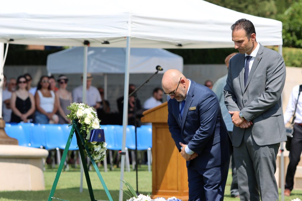 Johnny Matherne, superintendent of Rhone American Cemetery, and David Americo, ABMC chief of Cemetery Operations, pay their respects in front of the ABMC wreath during the ceremony honoring the 81st anniversary of Operation Dragoon Aug. 16, 2025, in Draguignan, France