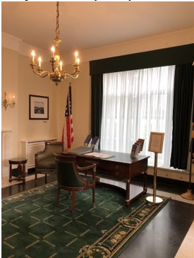 Picture of St. Mihiel American Cemetery's reception room in 2023 after the historic furnishing project. Credit: American Battle Monuments Commission.