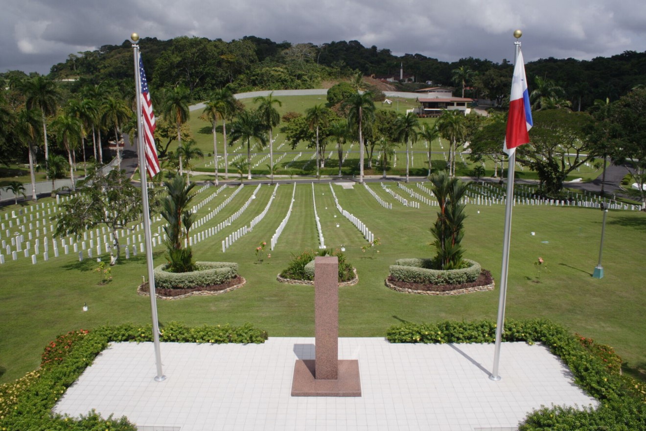 Flags flying at Corozal American Cemetery. Credits: American Battle Monuments Commission - Uth