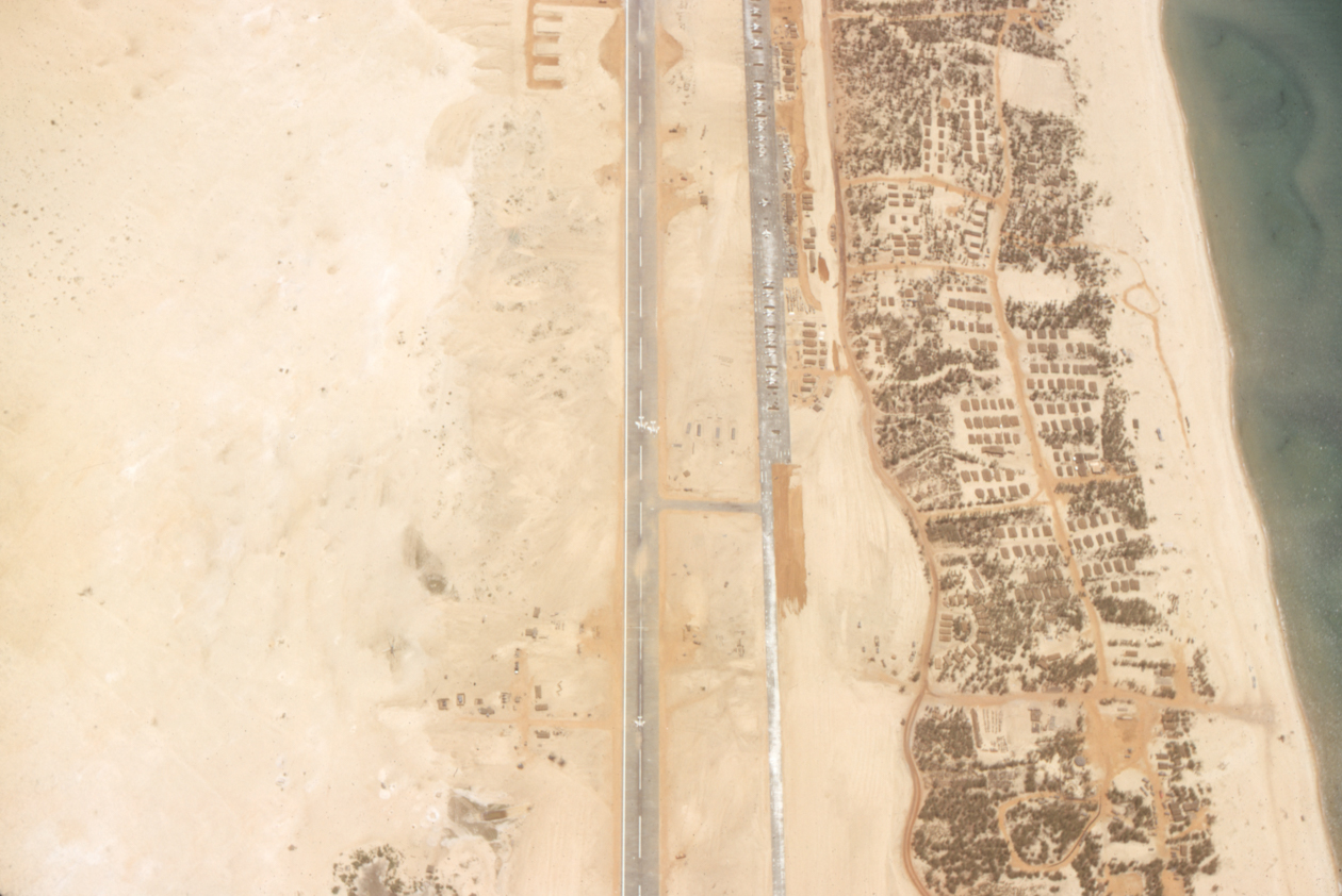 Aerial photograph of the finished runway and Marine camp at Chu Lai Airbase, c.1965. The Fred Quarnstrom Vietnam War Collection, Box 1, Folder 6.