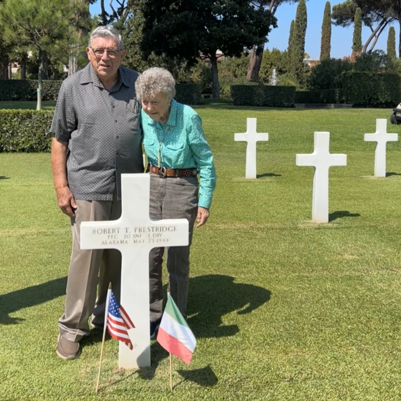 Travis Prestridge stands with his wife Arneta at his father’s grave, Pfc. Prestridge, who was killed in action during the breakout of the Anzio Beachhead on May 23, 1944, in World War II, as Sicily-Rome American Cemetery. Travis Prestridge stands with his wife Arneta at his father’s grave, Pfc. Prestridge, who was killed in action during the breakout of the Anzio Beachhead on May 23, 1944, in World War II, as Sicily-Rome American Cemetery.