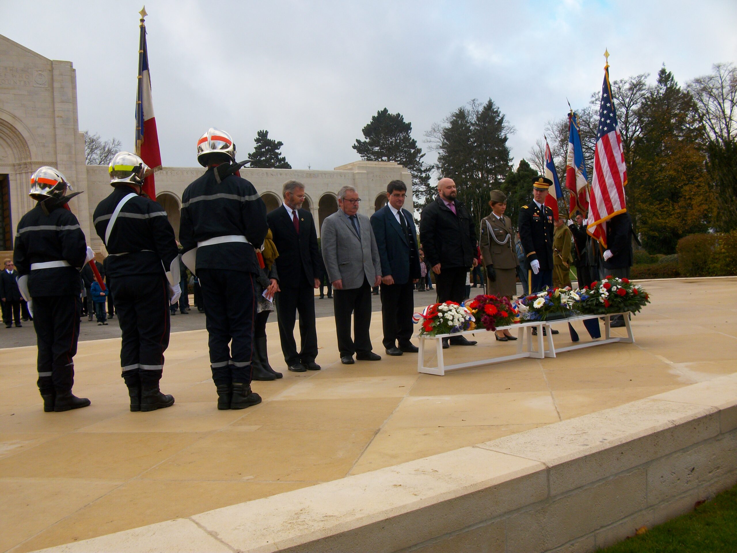 Members of the official party laid wreaths during the 2015 Veterans Day/Armistice Day Ceremony at Meuse-Argonne American Cemetery.