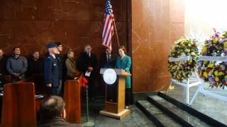 U.S. Consul General in Florence Abigail Rupp reads the President's Veterans Day Proclamation during the 2016 ceremony.