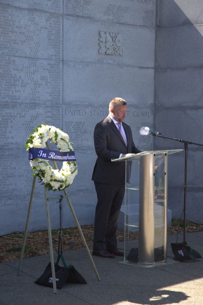 ABMC Historian Ben brands gives remarks May 22, 2025, at the dedication of the new inscription at the West Coast Memorial honoring U.S. Merchant Marines.